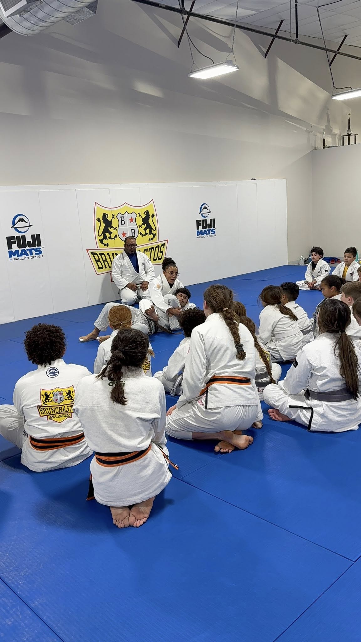 Bastos BJJ Midland group photo with kids program